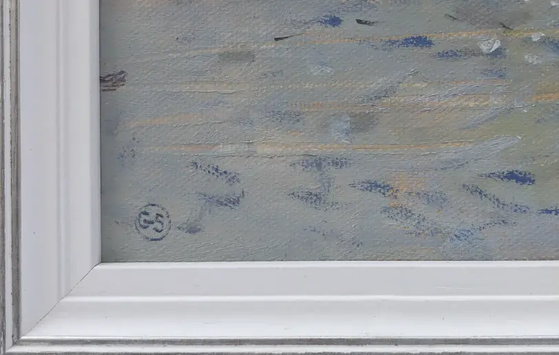 Close up of the white wood picture frame and the artist's signature over the painted water.