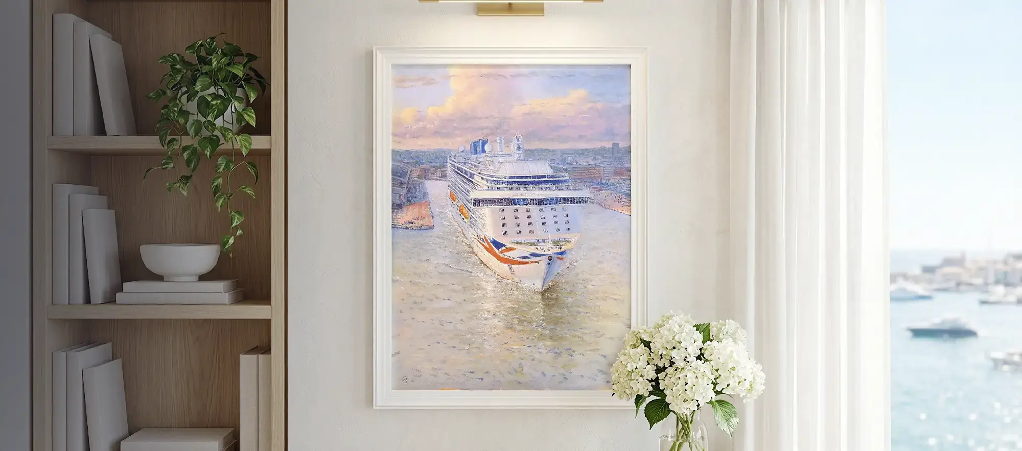 Framed portrait-orientation painting of Britannia hanging on a white wall above a light wood console table decorated with white hydrangeas.
