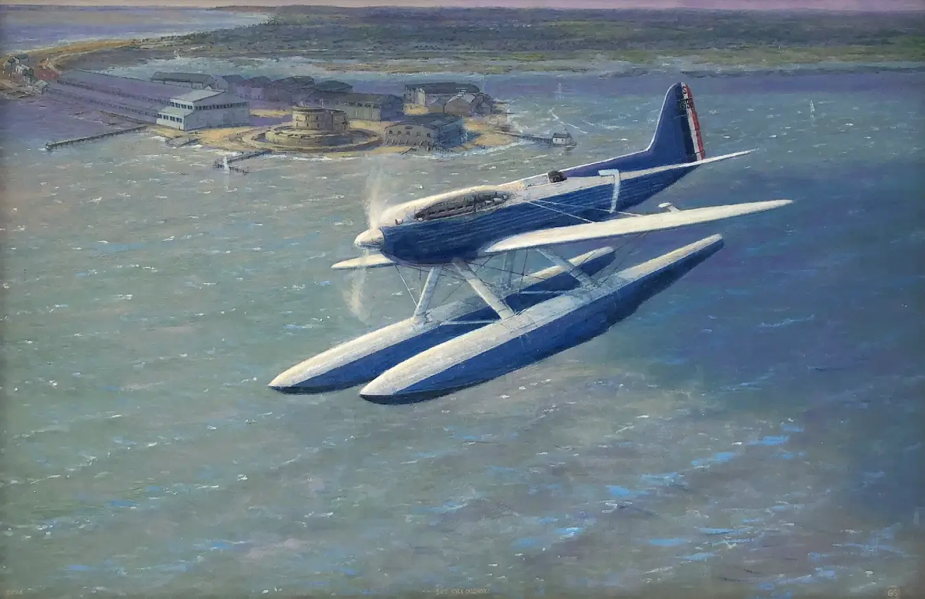 Oil painting of a Supermarine S.6B racing seaplane banking sharply over the blue waters of the Solent, with Calshot Castle and hangars in the background.