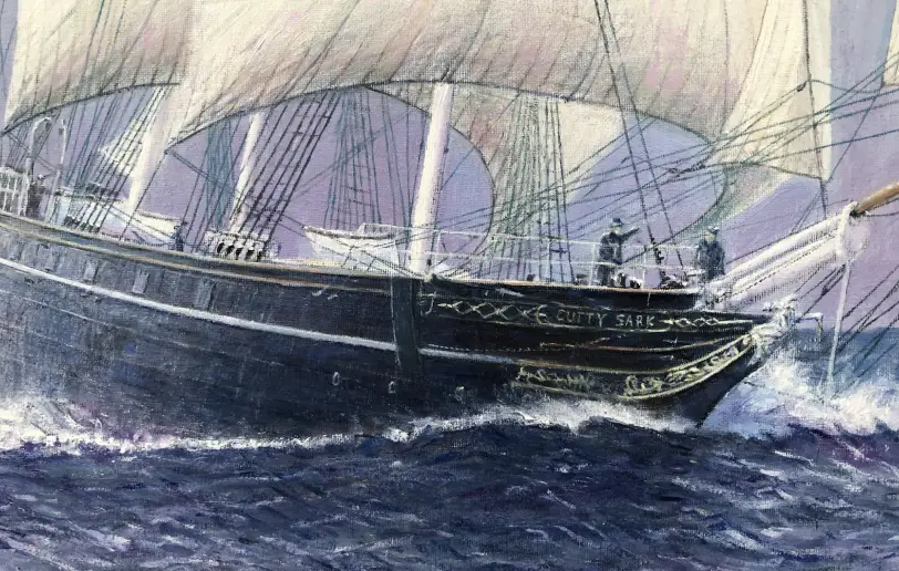 Close up of the ship's dark hull plunging through the choppy blue waves, showing the intricate rigging and crew on deck.