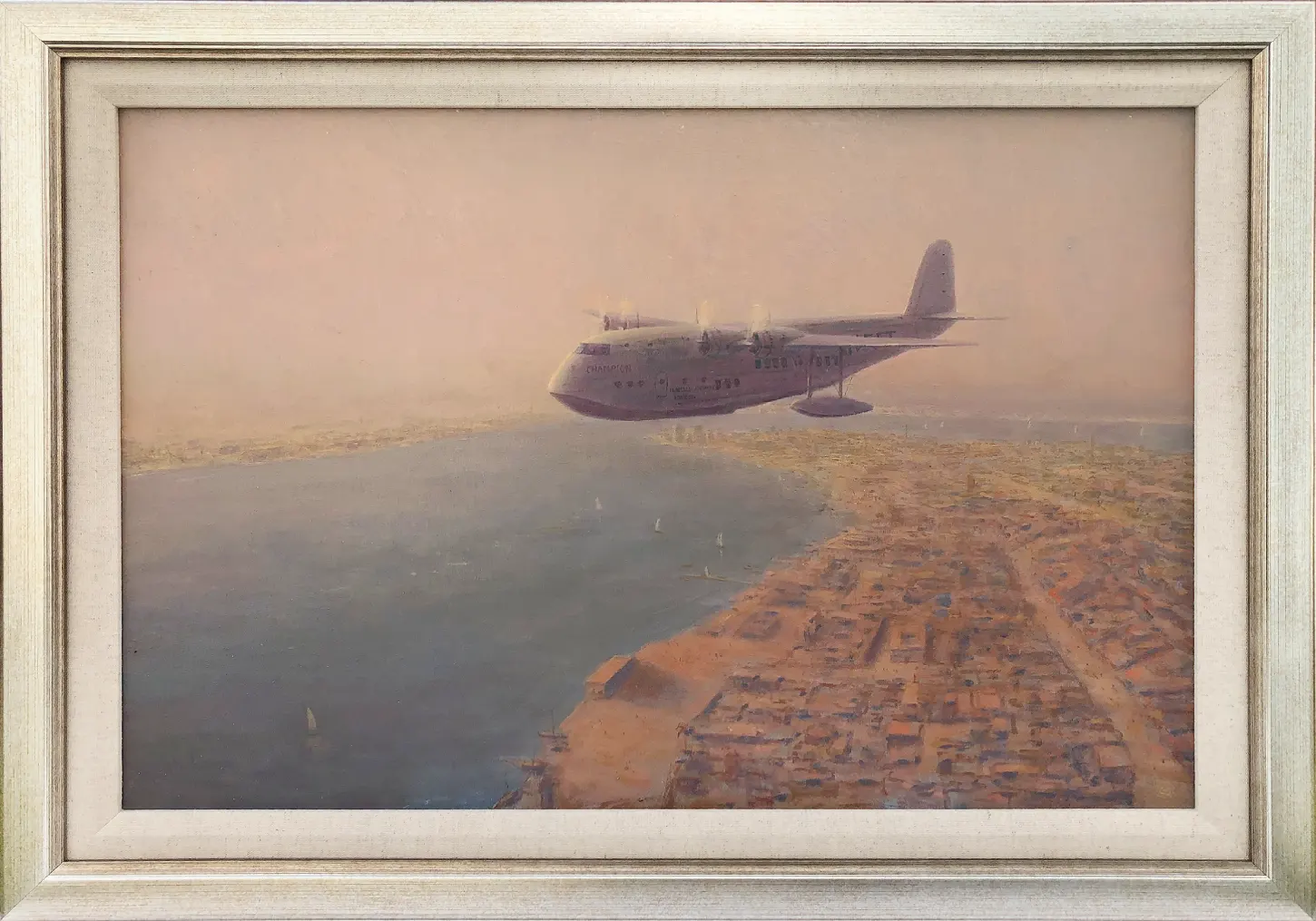 Oil painting in a champagne gold frame with a linen slip, showing a large Short Empire flying boat navigating an atmospheric, warm evening haze over Dubai Creek and its historic town layout.