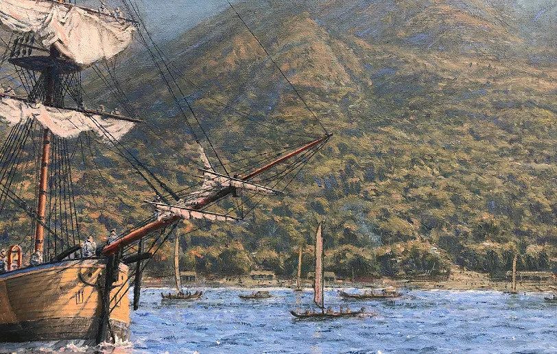 Close-up detail of HMB Endeavour's bowsprit and rigging set against the verdant, tropical mountains of Tahiti.