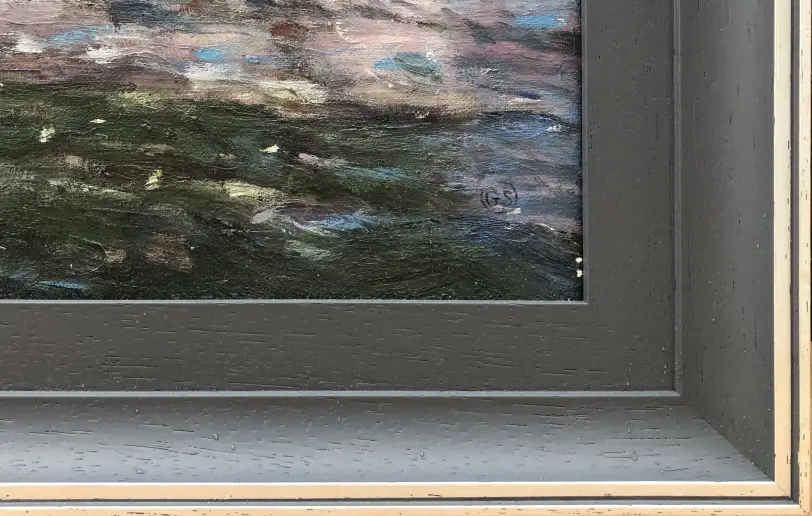 Close up of the dark grey wooden picture frame and pale inner slip, showing the textured oil paint of the river water.