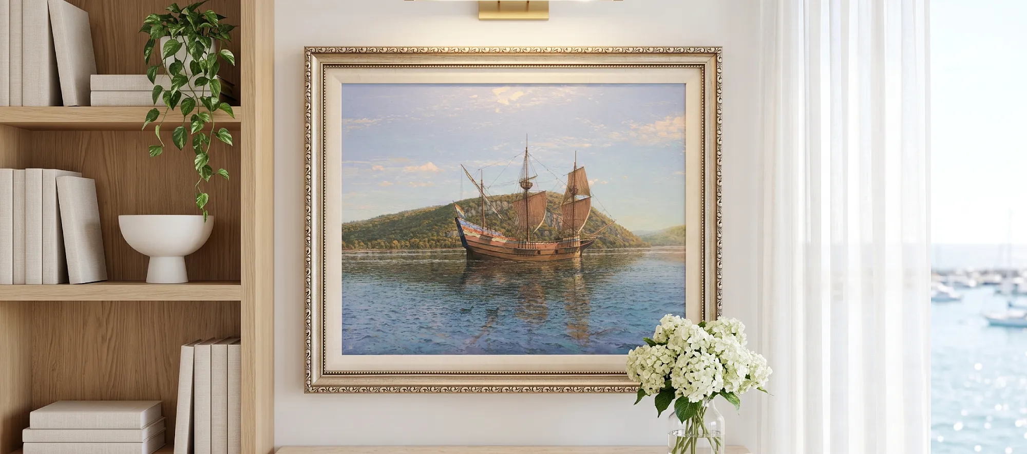 Framed oil painting of Henry Hudson's ship Half Moon elegantly displayed in a sunlit interior room above a console table with fresh white hydrangeas.