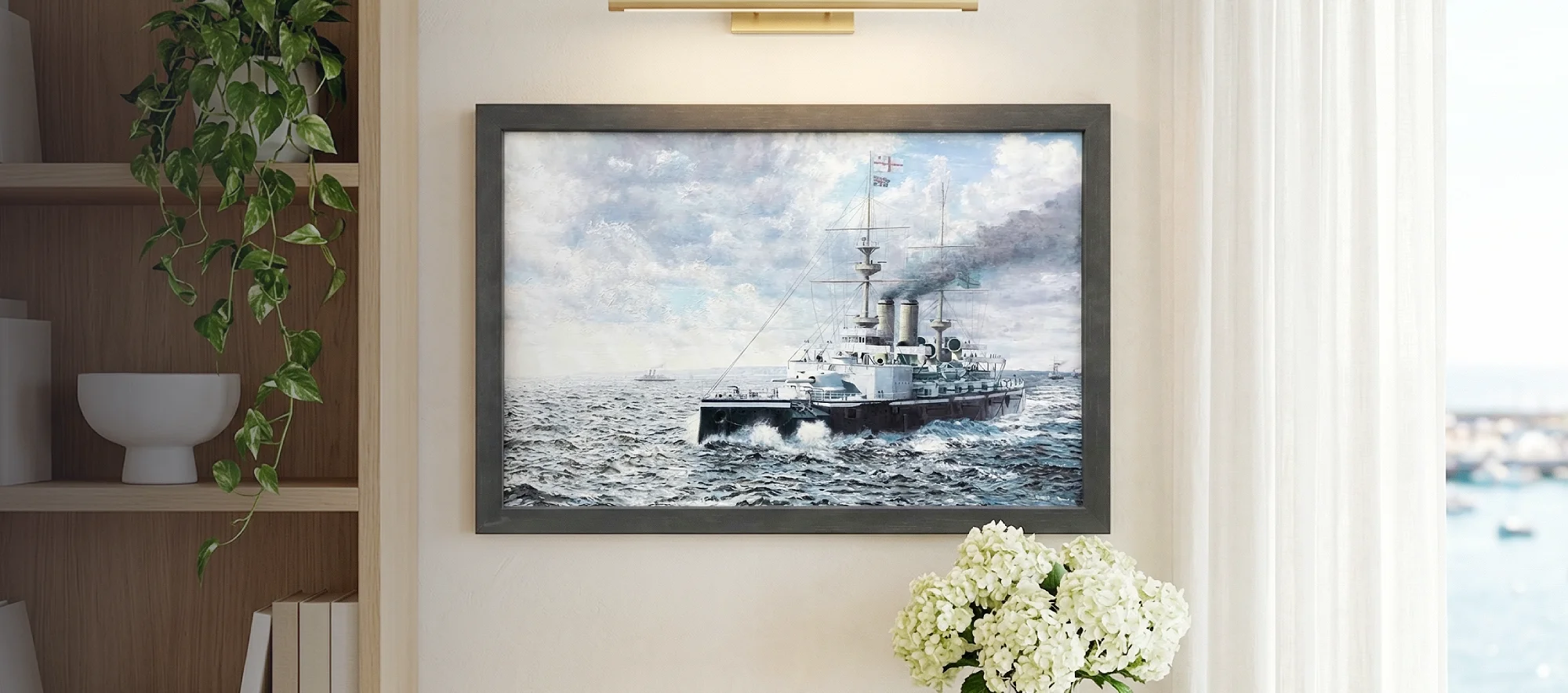 Framed painting of HMS Majestic hanging on a white wall above a light wood console table decorated with white hydrangeas.