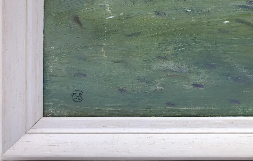 Close up of the white wood picture frame and the artist's signature painted in the bottom corner of the canvas.