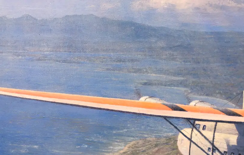 Close up of the left side of the painting, showing the long silver wing of the aircraft and the distant Hawaiian mountains.