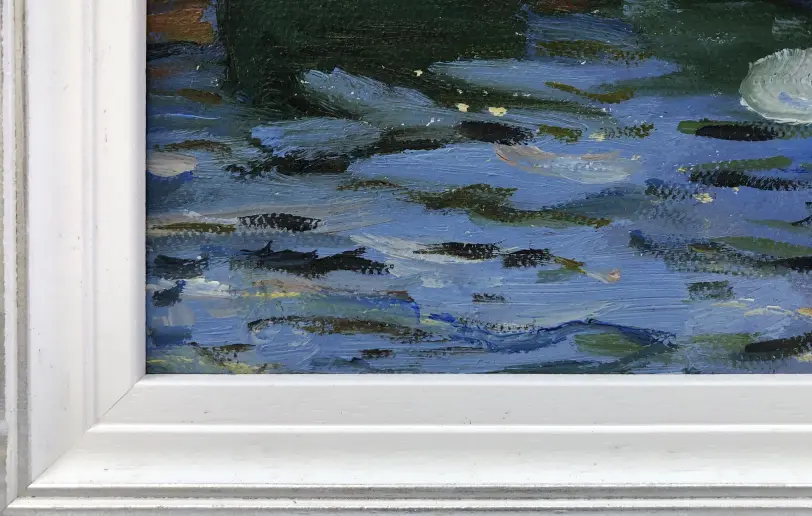 Close up of the white wood picture frame and the energetic, textured oil paint of the choppy water.