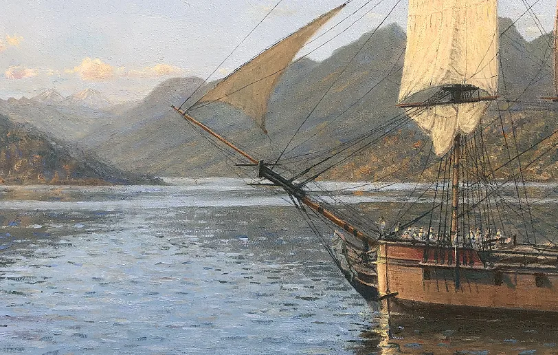 Close-up detail showing the intricate bowsprit, rigging, and sails of HMS Resolution set against distant New Zealand hills.