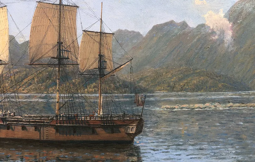 Close-up detail of HMS Resolution's hull, stern, and glassy water reflections in Dusky Sound.