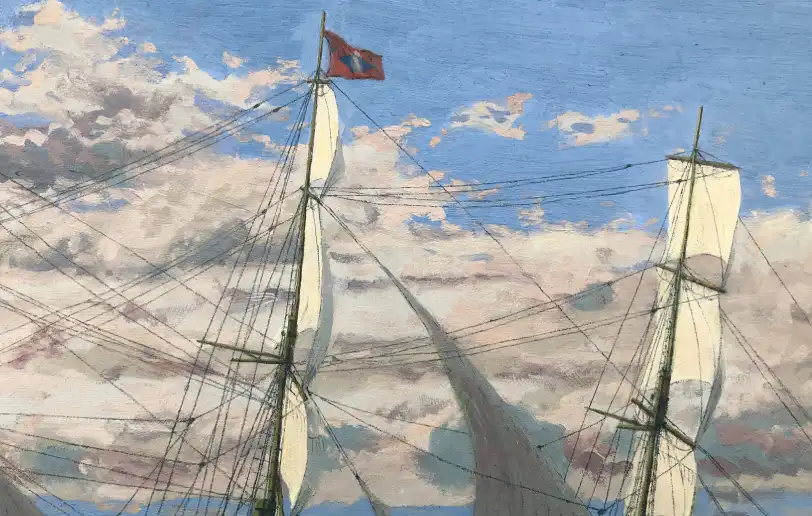 Close up of the ship's mainmast and upper yards, showing the white canvas sails catching the light and a red house flag flying at the very top.