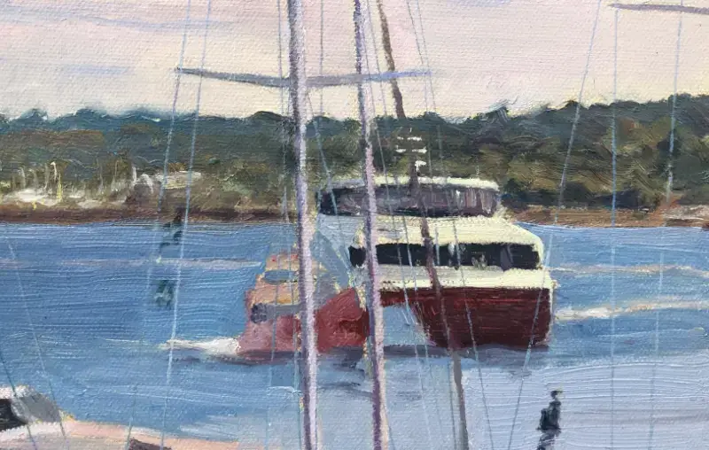 Close up of the Red Jet ferry and distant treeline across the water.