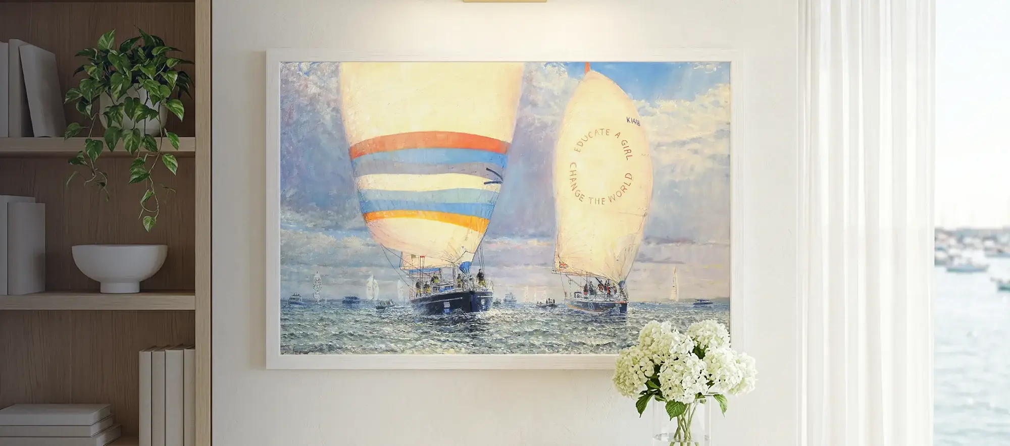 Framed painting of Translated 9 and Maiden hanging on a white wall above a light wood console table decorated with white hydrangeas.